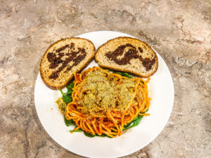plant-based-Parmesan-cheese-on-spaghetti